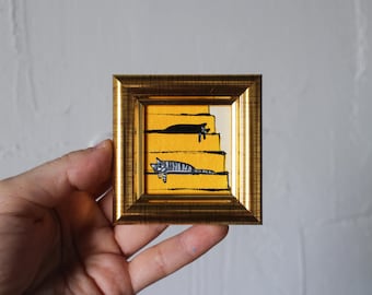 Mini painting a gray tabby and black cats is sleeping on the stairs oil painting framed 2x2 in Original Handmade painting