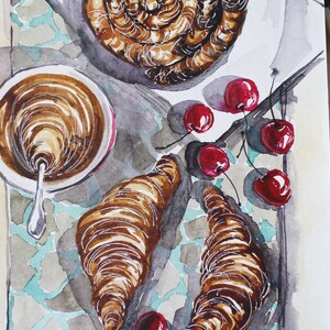 May include: A watercolor painting of a breakfast scene with a cup of coffee, two croissants, and a swirl of pastry. There are also red cherries scattered around the food.