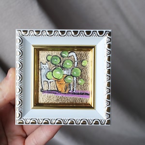 El gato blanco volcó la maceta Pintura al óleo con pan de oro 2x2 cuadro original enmarcado cuadro gato blanco original enmarcado