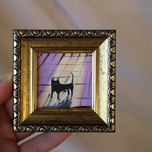 Сat met een grote schaduw olieverfschilderij 2 x 2 origineel schilderij ingelijst zwarte kat schilderij origineel ingelijst