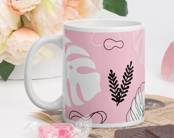 Mug monstera leaves abstract shapes on pink background, coffee tea chocolate cup tropical leaves, plants, leaves, tropical, exoticism