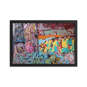 May include: A colorful graffiti wall with a variety of colors and designs, including yellow, blue, green, red, orange, and pink. The graffiti is on a brick wall and is covered in layers of paint.