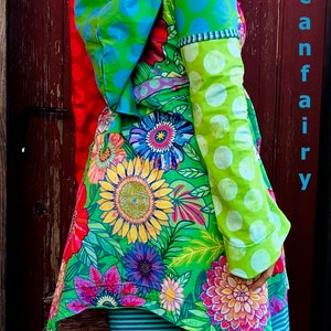 Colorful hooded dress with fairy sleeves