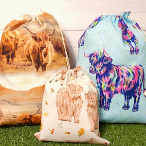 Highland Cow reusable gift bags, three different cotton fabrics featuring cows.