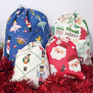Kordelzug Stoff Weihnachtsgeschenk Taschen, Weihnachtsmann, Nussknacker, Frieden und Freude
