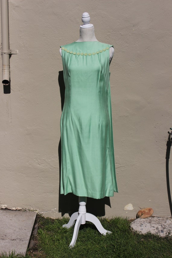 mint green 1950s dress Delicate mint green 1950s style party dress, swing skirt and halter top. So pretty! #1950s #1950sfashion #party #dress #mint #mintgreen #vintage #vintagestyle #rockabilly #fashion #promoted