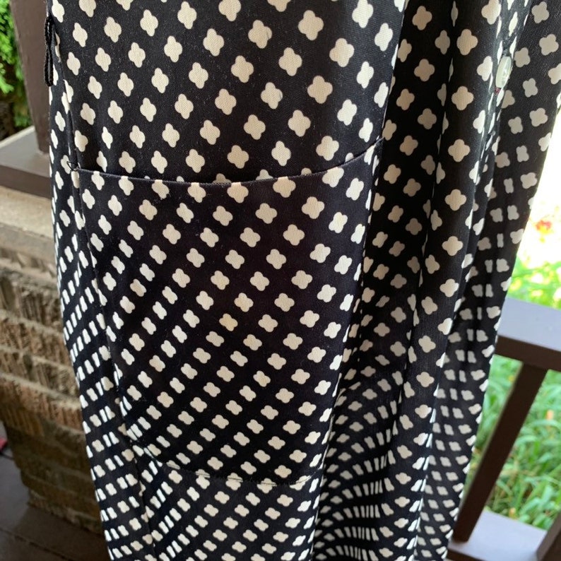 1960s calf length black with white details and pockets shirt dress rockabilly pinup