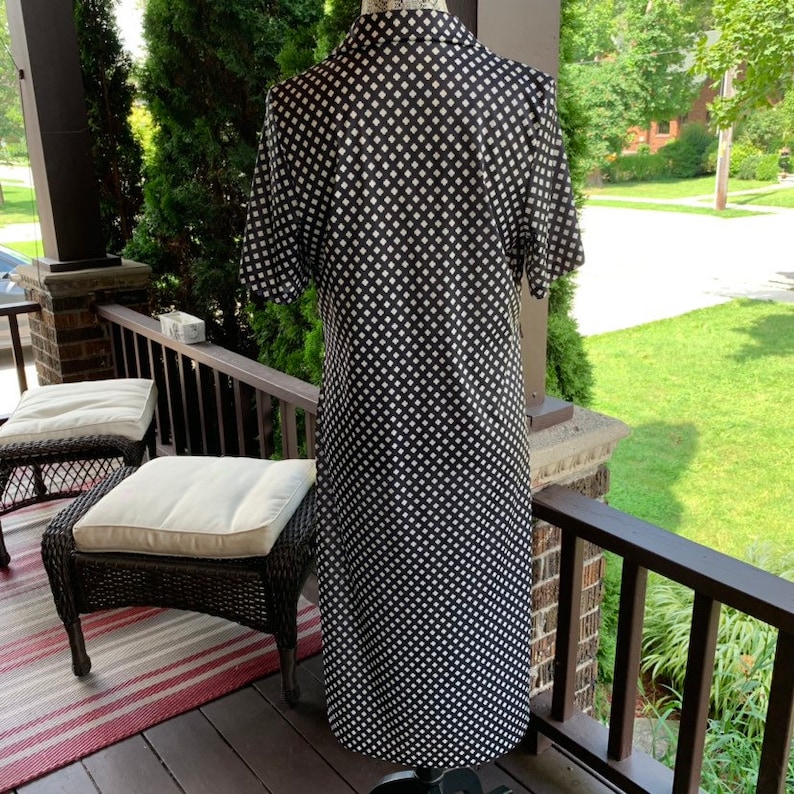 1960s calf length black with white details and pockets shirt dress rockabilly pinup