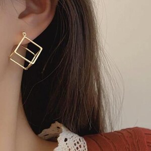 Golden Infinity Cube Drop Earrings