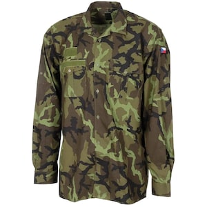 May include: A long-sleeve button-down shirt featuring a camouflage pattern in shades of olive green, brown, and black. The shirt includes two chest pockets with flaps, a collar, and a small Czech Republic flag patch on the upper left sleeve.