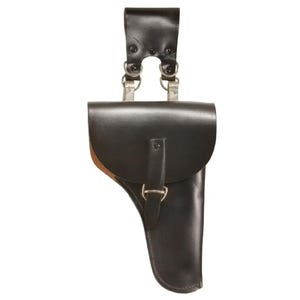 May include: Black leather holster with a flap closure and a belt loop. The holster has a shoulder strap with metal clips and rivets. The leather is smooth and the stitching is visible. The holster is designed to hold a handgun.