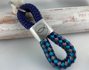 Key ring made of sailing rope with a silver-plated intermediate piece with engraving "Fish", dark blue/dark blue-petrol-grey