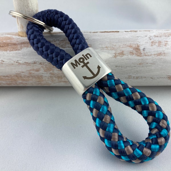 Schlüsselanhänger aus Segelseil mit versilbertem Zwischenstück mit Gravur "Moin mit Anker", dunkelblau/ dunkelblau-petrol-grau
