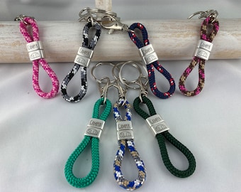 Small keyring made of sailing rope with silver-plated spacers with engraving "Camper and Caravan" in desired color