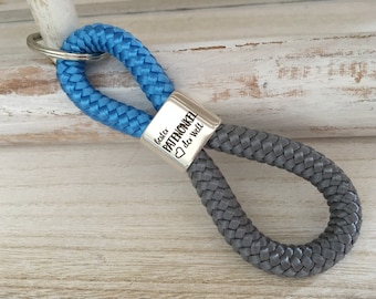 Key ring made of sailing rope with silver-plated intermediate piece with engraving "Best godfather in the world" sky blue/grey