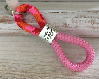 Key ring made of sailing rope with a silver-plated intermediate piece with engraving "Best educator in the world" orange-pink-red mix/pink