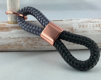 Key ring made of sailing rope with an intermediate piece in rose gold, grey/dark grey