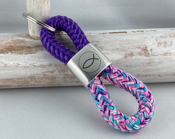 Key ring made of sailing rope with a silver-plated intermediate piece with engraving "Fish", purple/pink-purple-light blue