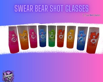May include: Set of eight shot glasses with colorful Care Bear designs. Each glass features a different bear with unique colors and phrases. The glasses are 2.5oz and have a gradient color effect. The text "SWEAR BEAR SHOT GLASSES" is at the top.