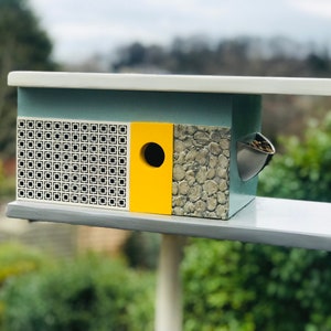 Mid Century California Modern birdhouse with feeder and table