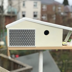 Mid-Century Modern Palm Springs style birdhouse with a laser cut screen, car port and period car