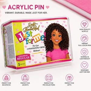 May include: A rectangular acrylic pin featuring the Soft & Beautiful Just for Me! No-Lye Conditioning Crème Relaxer box design. The graphic shows a smiling child with curly hair in a pink shirt against a yellow background with pink hearts.