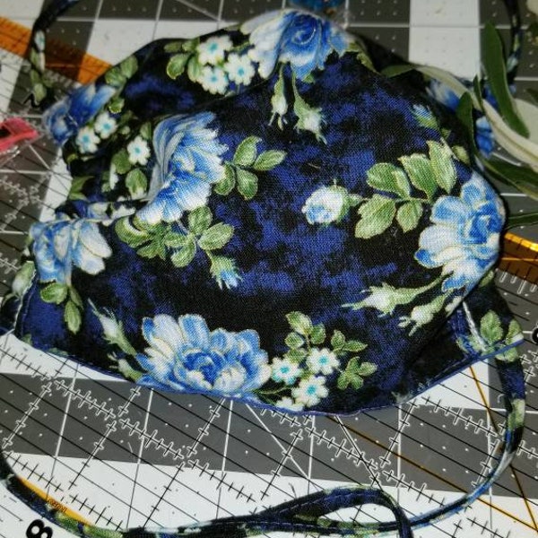 Blue floral reusable face mask with a tie string or elastic