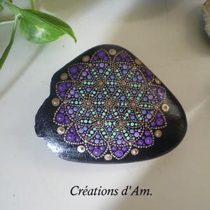 Flower of Life painted pebble