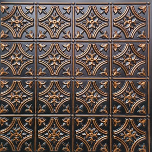 May include: A square, decorative ceiling tile with a repeating pattern. The tile has a dark, matte background with raised, copper-colored floral and geometric designs. The design includes stylized flowers, leaves, and curved lines, creating a vintage or antique aesthetic.