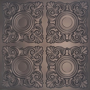 May include: A decorative ceiling tile with a brown finish and an ornate design featuring four circular medallions. The tile has a raised, textured surface.