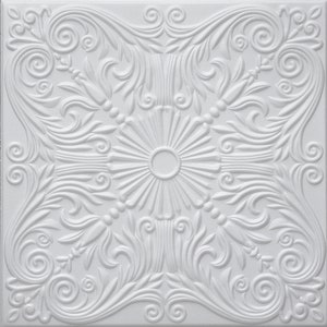May include: White ceramic tile with an embossed design of a floral pattern. The design features intricate swirls and leaves, creating a symmetrical and elegant look.