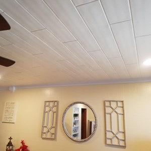 White Styrofoam Ceiling Planks to cover popcorn ceiling or solid flat surface. Model #98. Glue up decorative polystyrene planks.