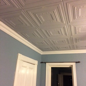 Styrofoam Ceiling Tiles - popcorn ceiling cover. Easy DIY installation - Glue up over stucco. Model #RM31