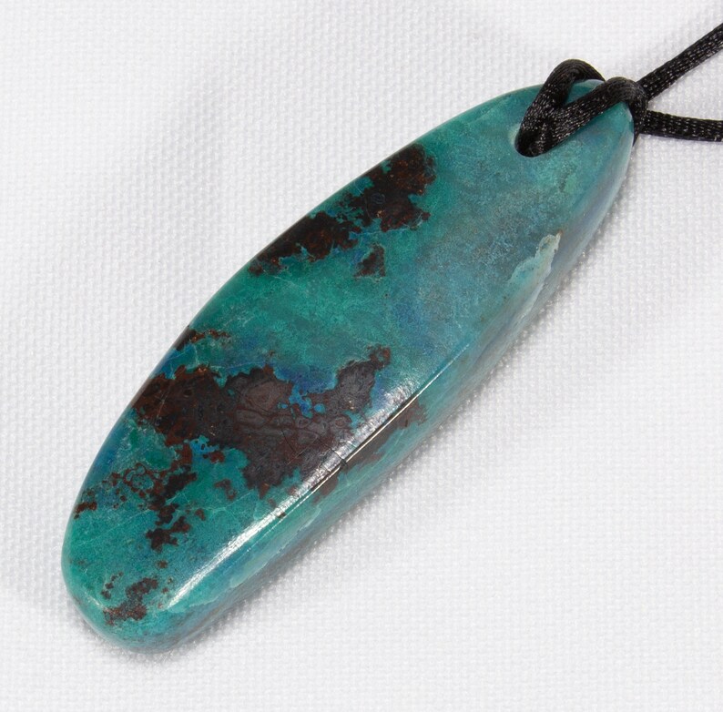 polished and fitted with Cord Shattuckite Pendant
