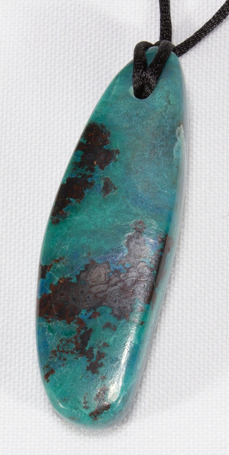 polished and fitted with Cord Shattuckite Pendant