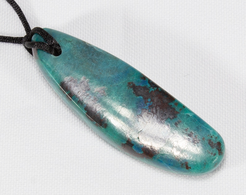 polished and fitted with Cord Shattuckite Pendant
