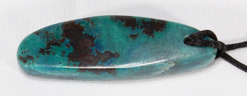 polished and fitted with Cord Shattuckite Pendant