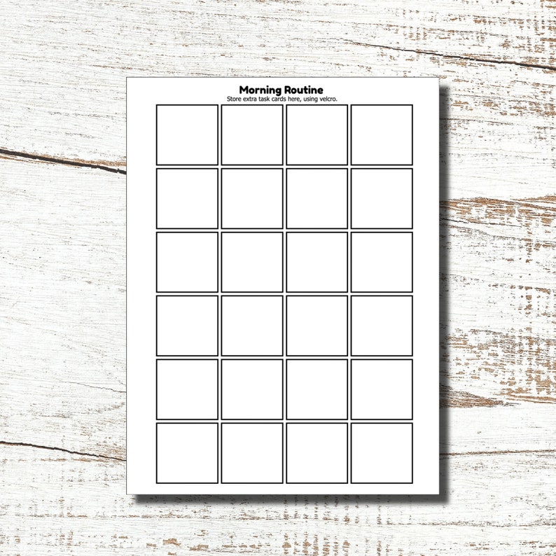 Puede incluir: Un papel blanco con una cuadr&iacute;cula de 20 cuadrados en blanco, cada uno con un contorno negro. El texto "Morning Routine" est&aacute; en la parte superior, con instrucciones para guardar tarjetas de tareas adicionales con velcro.