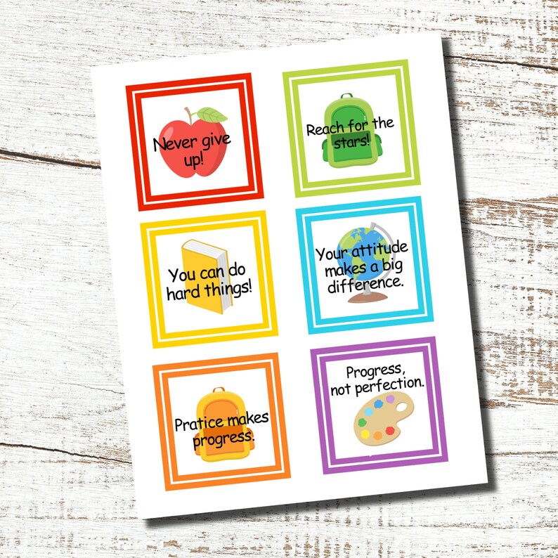 May include: A sheet of colorful motivational cards with various illustrations and phrases. The cards include an apple, backpack, book, globe, and paint palette. Phrases include "Never give up!", "Reach for the stars!", and "You can do hard things!"
