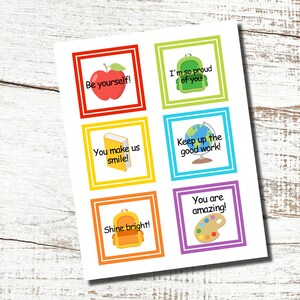 May include: A sheet of colorful square stickers with motivational phrases. Each sticker has a white background, a colored border, and a graphic. Phrases include "Be yourself!", "I'm so proud of you!", and "You are amazing!"