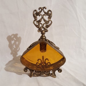 1940&#39;s 9.5&quot; lg. ornate antique gold gilt ormolu brass filigee metal & beveled amber glass perfume bottle tall glass stopper ribbon accented