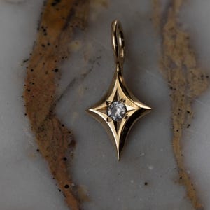 Guld Nova Star Berlock - Vit Safir/Diamant - 14k massivt guld bild 1