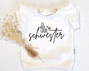 Shirt - Cremeweiss mit Rüschen - Ich werde gr. Schwester (schwarz-rose) - von Sharlene Babymode Handmade in Germany