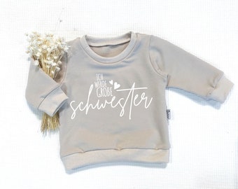 Creme - Ich werde große Schwester (schwarz o. weiss) - Sweater von Sharlene Babymode Handmade in Germany Baby Pullover, Oberteil, Sweatshirt