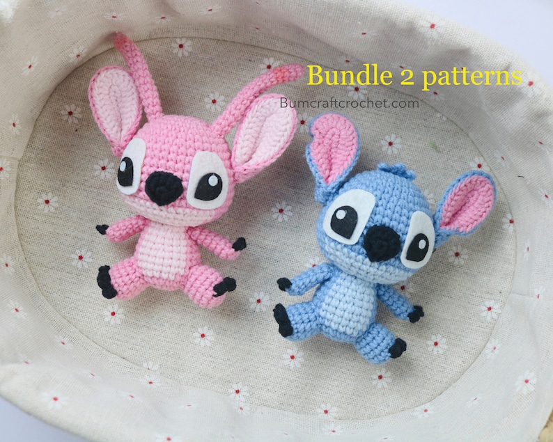 May include: Two crocheted plush toys in a basket. One is pink with black eyes and a black nose. The other is blue with black eyes and a black nose. The text "Bundle 2 patterns" and "Bumcraftcrochet.com" is visible in the image.