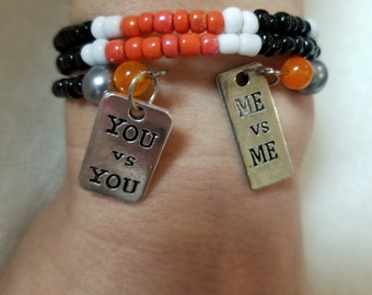 22" Orange/Blacl/White Seed Memory Bracelet with Charms