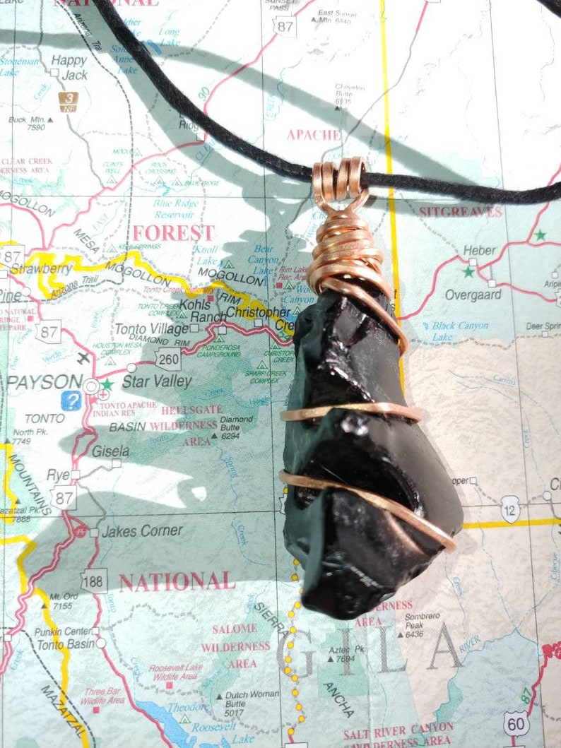 Natural obsidian totem in hand-hammered copper
