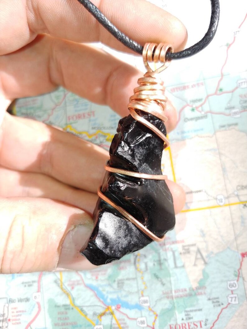 Natural obsidian totem in hand-hammered copper