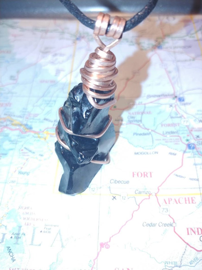Natural obsidian totem in hand-hammered copper