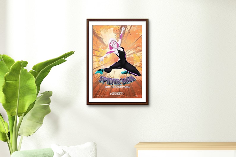 May include: A poster for the animated movie Spider-Man: Into the Spider-Verse. The poster features Spider-Gwen, a female Spider-Man character, in a black and white suit with pink accents. She is posed in a dynamic action pose, with a bright orange and yellow background.